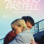 Jannis Niewöhner und Sylvaine Faligant umarmen sich unter einer Brücke - Allegro Pastell
