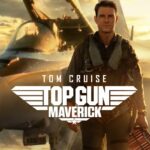 Tom Cruise vor einem Fighter im Abendsonnenlicht - Top Gun Maverick