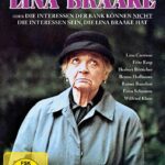 Eine alte Dame mit Hut schaut genervt in den Himmel - Lina Braake